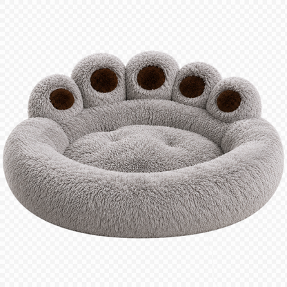 Gray pet bed shaped like a paw with brown pads on a white background