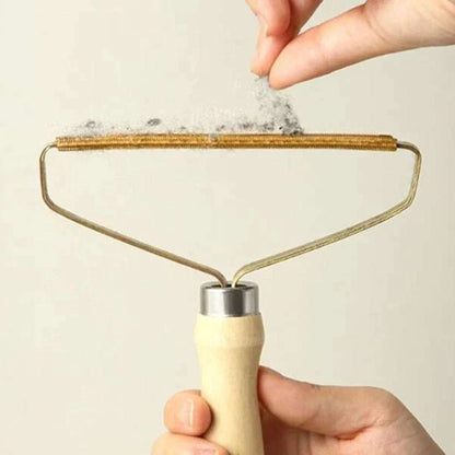 Pet Hair Remover for Dog and Cat Blufi pet hair remover in use, showing its effective design for removing pet hair from clothing and furniture.